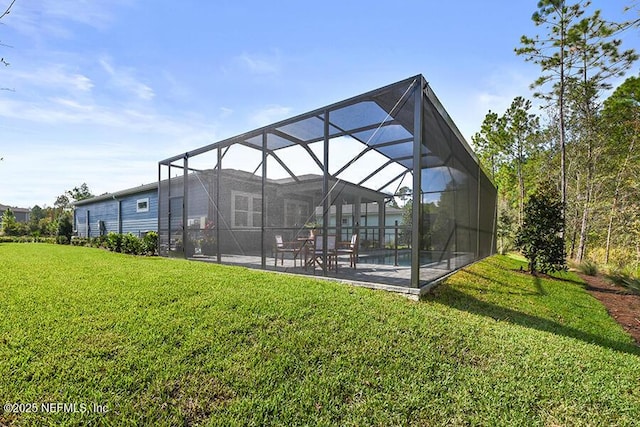 exterior space featuring glass enclosure and a patio