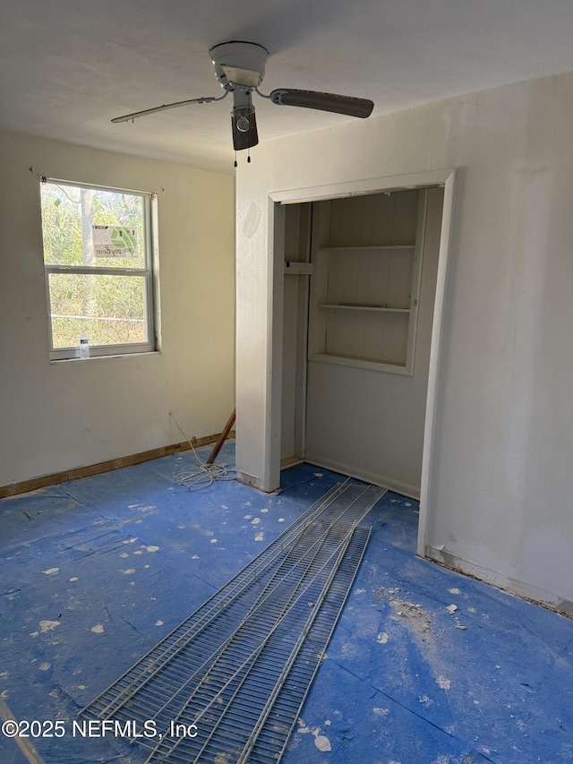 unfurnished bedroom with a ceiling fan