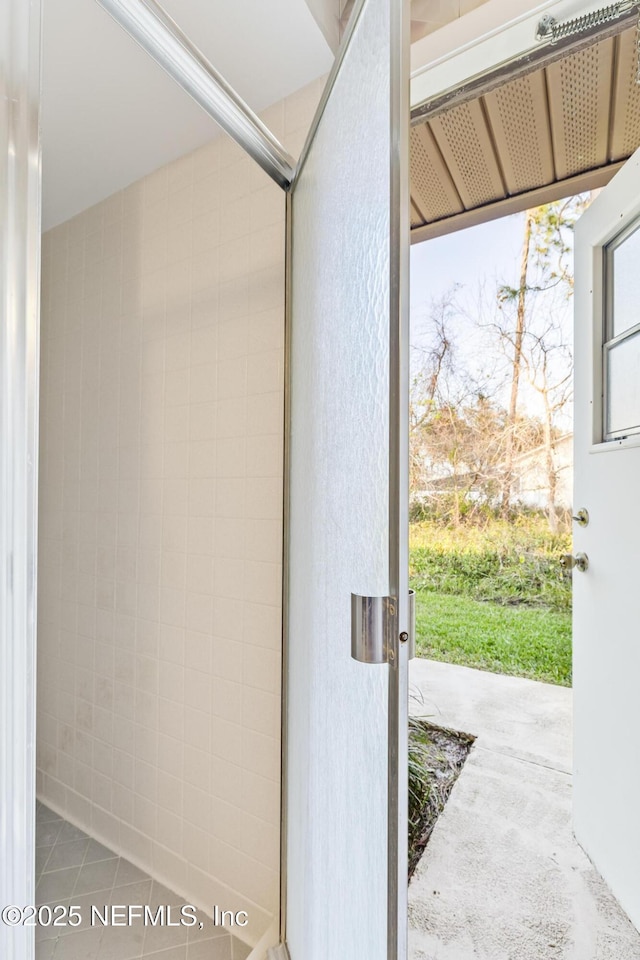 entryway featuring tile patterned flooring