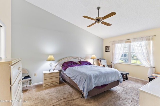 bedroom featuring carpet flooring, vaulted ceiling, and baseboards