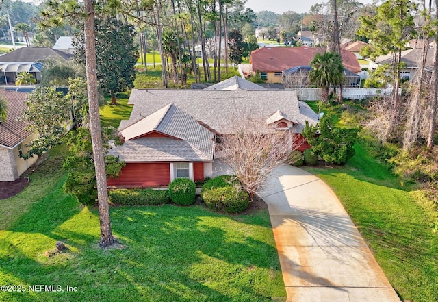 birds eye view of property with a residential view