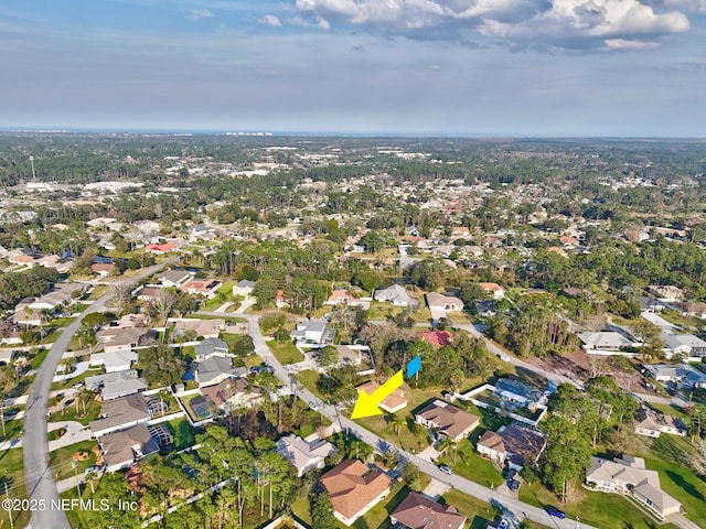 drone / aerial view with a residential view