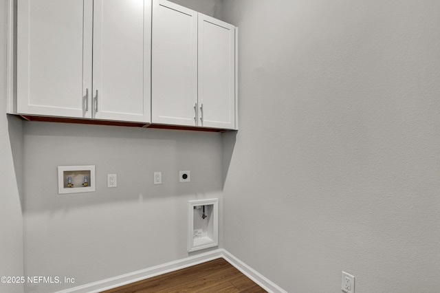 4484 Sun Garden Dr, Jacksonville, FL 32257 - laundry room with hookup for a washing machine, baseboards, dark wood finished floors, cabinet space, and electric dryer hookup