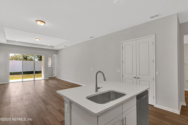 4484 Sun Garden Dr, Jacksonville, FL 32257 - kitchen featuring visible vents, a sink, light countertops, dishwasher, and a raised ceiling