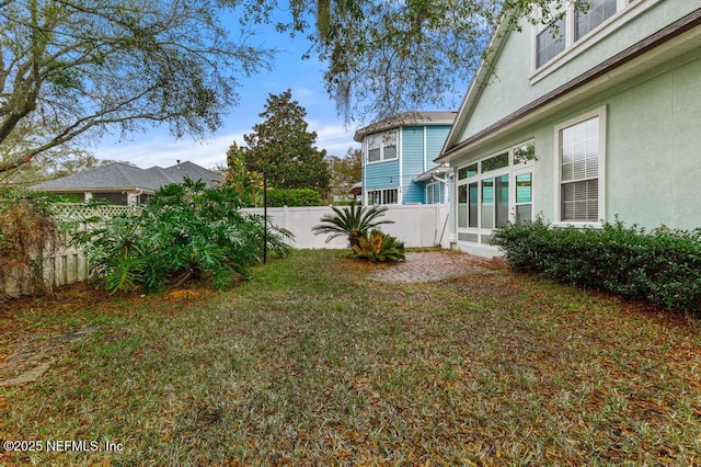 view of yard with fence