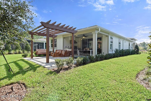 exterior space with a patio, ceiling fan, and a pergola