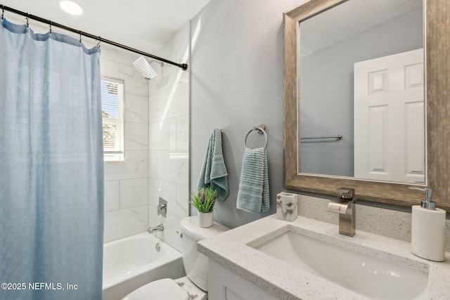 full bath featuring vanity, toilet, and shower / bath combo with shower curtain