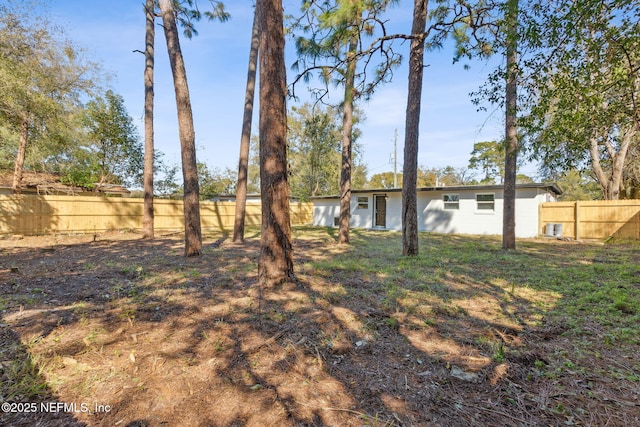 view of yard featuring fence