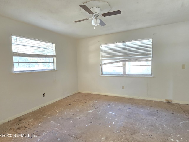 empty room featuring a ceiling fan