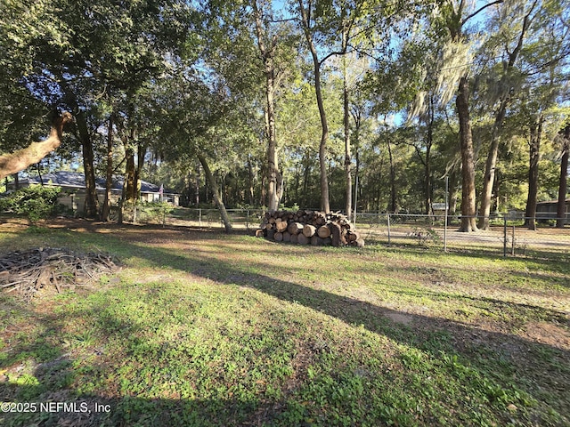 view of yard with fence