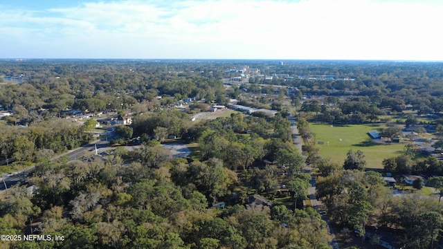 aerial view with a wooded view