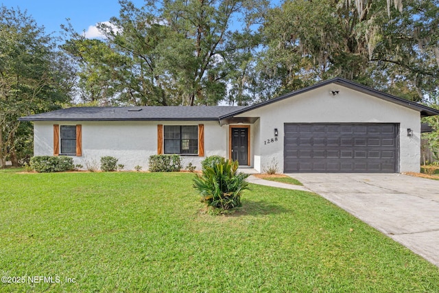 ranch-style house featuring driveway, a front lawn, an attached garage, and stucco siding