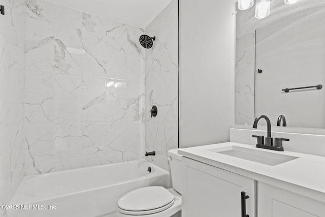 bathroom featuring bathing tub / shower combination, toilet, and vanity