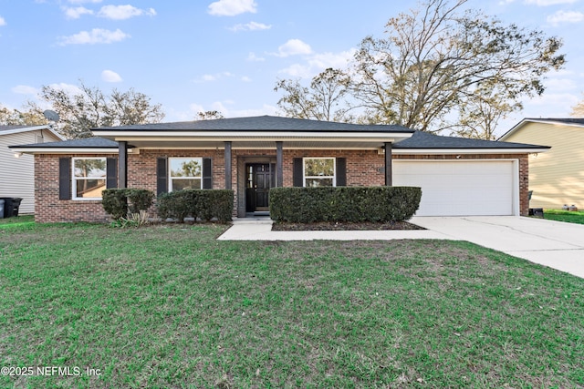 ranch-style home with a garage, concrete driveway, brick siding, and a front lawn