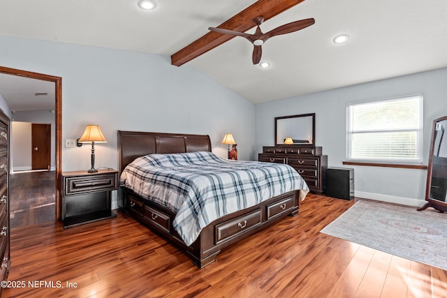 bedroom featuring baseboards, a ceiling fan, wood finished floors, vaulted ceiling with beams, and recessed lighting