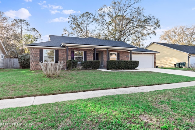 ranch-style house featuring a garage, brick siding, fence, driveway, and a front lawn