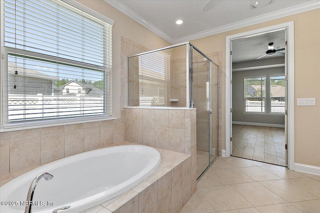 bathroom featuring tile patterned flooring, crown molding, a shower stall, and a bath