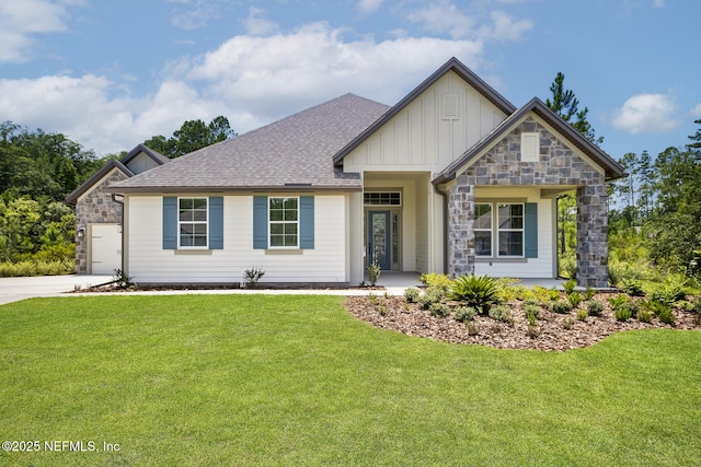 view of front facade featuring stone siding, roof with shingles, board and batten siding, and a front yard