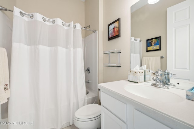 full bath featuring shower / tub combo with curtain, vanity, and toilet