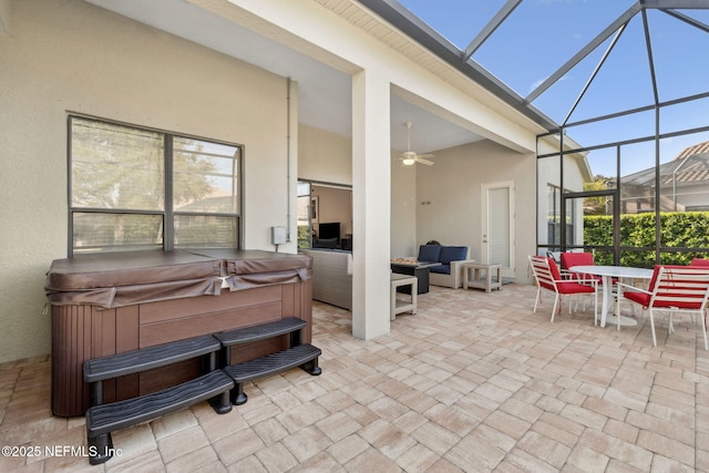 sunroom / solarium with ceiling fan