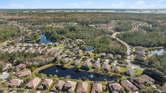 aerial view featuring a water view and a residential view