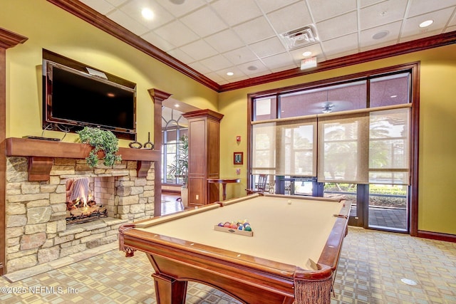 game room with baseboards, visible vents, pool table, crown molding, and a fireplace