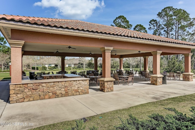 view of patio with outdoor dining space and area for grilling