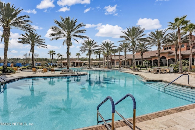 pool with a patio area