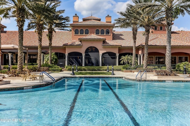 pool with a patio area