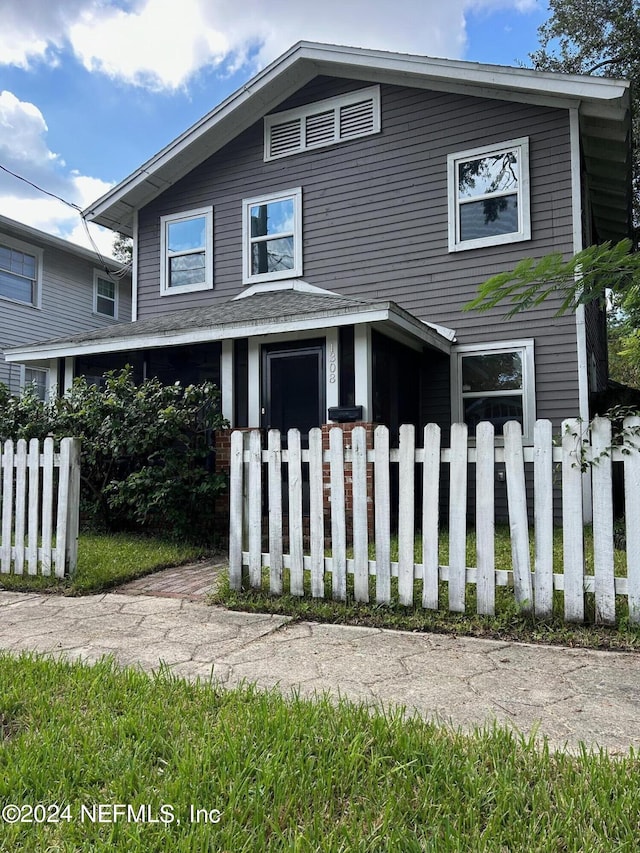 view of front facade with a fenced front yard