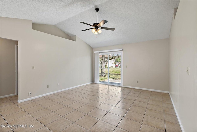 unfurnished room with lofted ceiling, a ceiling fan, light tile patterned flooring, a textured ceiling, and baseboards