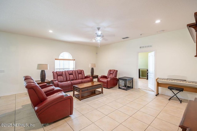 living room with recessed lighting, visible vents, a ceiling fan, and light tile patterned flooring