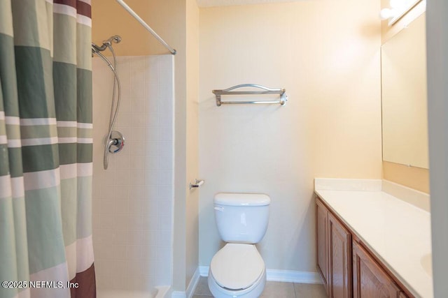 bathroom featuring baseboards, a shower with shower curtain, toilet, tile patterned floors, and vanity