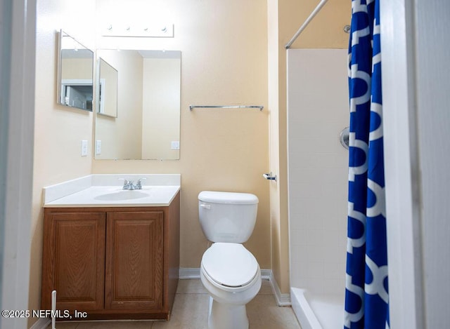 bathroom with toilet, a stall shower, vanity, baseboards, and tile patterned floors