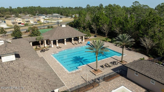 pool featuring a patio, a gazebo, and fence