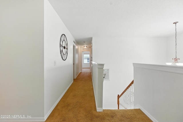75250 Fern Creek Dr, Yulee, FL 32097 - hallway with an upstairs landing and light colored carpet