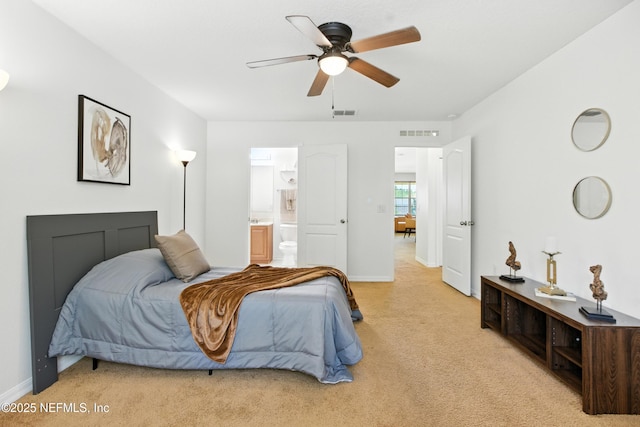 75250 Fern Creek Dr, Yulee, FL 32097 - bedroom featuring light colored carpet, connected bathroom, and ceiling fan