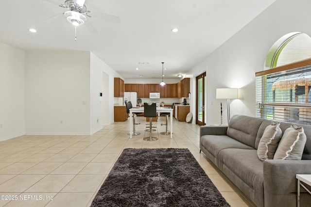 75250 Fern Creek Dr, Yulee, FL 32097 - living room with light tile patterned floors, recessed lighting, and ceiling fan