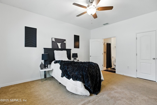 75250 Fern Creek Dr, Yulee, FL 32097 - bedroom with carpet, connected bathroom, and ceiling fan