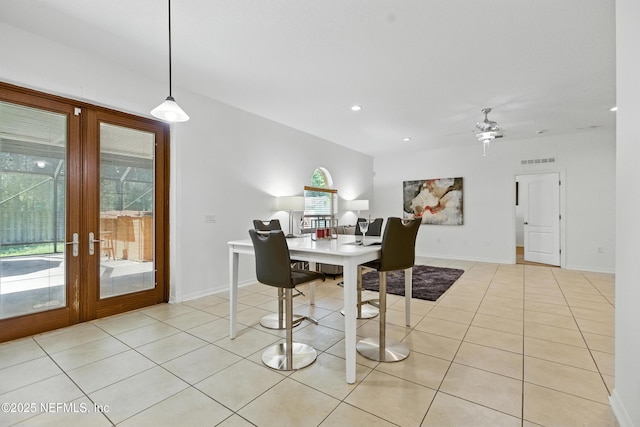 75250 Fern Creek Dr, Yulee, FL 32097 - dining room featuring french doors, light tile patterned flooring, ceiling fan, and recessed lighting
