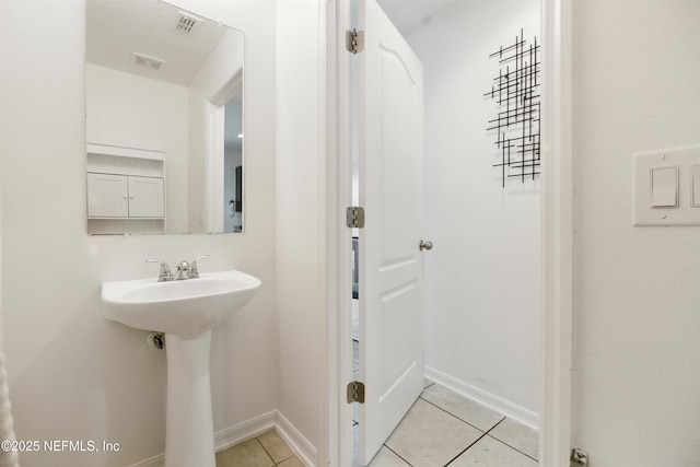 75250 Fern Creek Dr, Yulee, FL 32097 - bathroom with tile patterned floors and baseboards