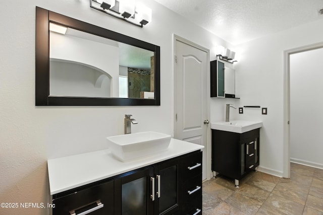 75250 Fern Creek Dr, Yulee, FL 32097 - bathroom featuring two vanities and stone finish floors