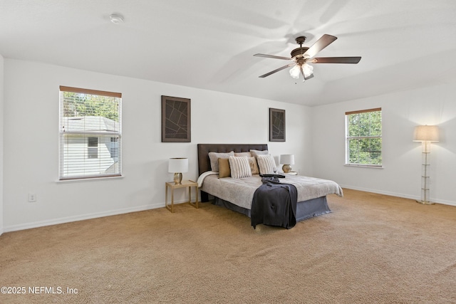 75250 Fern Creek Dr, Yulee, FL 32097 - bedroom featuring multiple windows, light carpet, and a ceiling fan