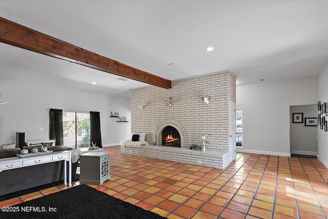 unfurnished living room with baseboards, a brick fireplace, beam ceiling, and tile patterned floors