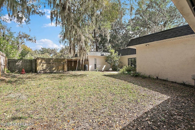 view of yard with fence