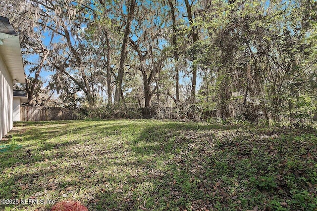 view of yard featuring fence