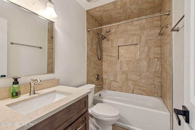 full bathroom featuring shower / bathtub combination, vanity, and toilet