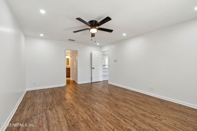 interior space with recessed lighting, visible vents, baseboards, and wood finished floors