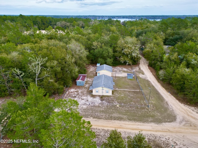 aerial view featuring a forest view