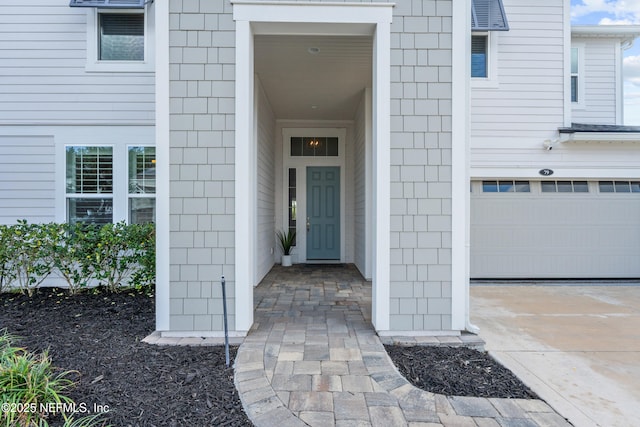 property entrance featuring a garage